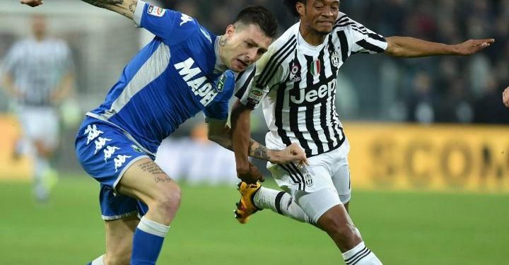 Cuadrado_Acerbi_Sassuolo_Juventus_lapresse_2017