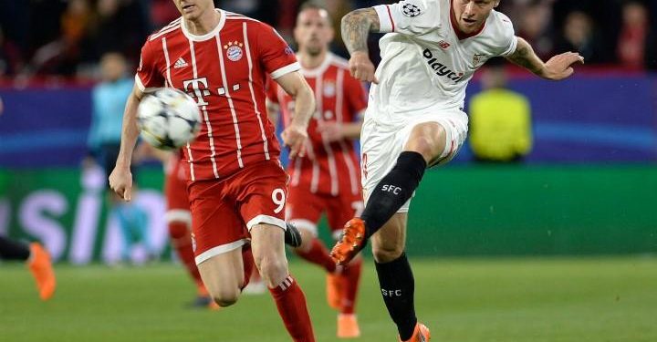 Lewandowski_Kjaer_Siviglia_Bayern_lapresse_2018