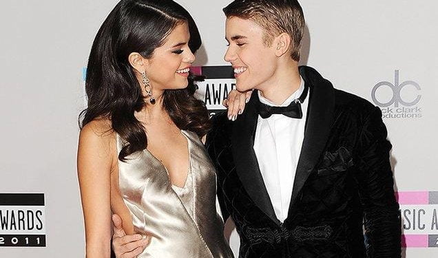 justin-bieber-selena-gomez-2011-ama-red-carpet-billboard-650