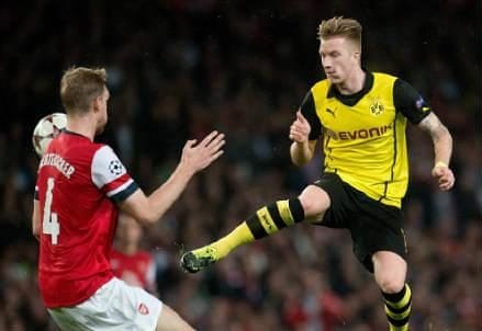 mertesacker_reus