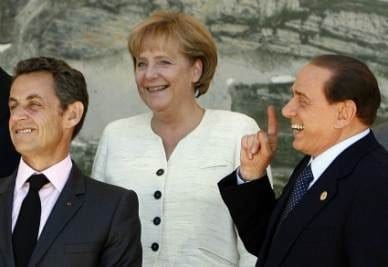 Sarkozy_Merkel_BerlusconiR400