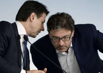 Giuseppe Conte e Giancarlo Giorgetti (LaPresse)