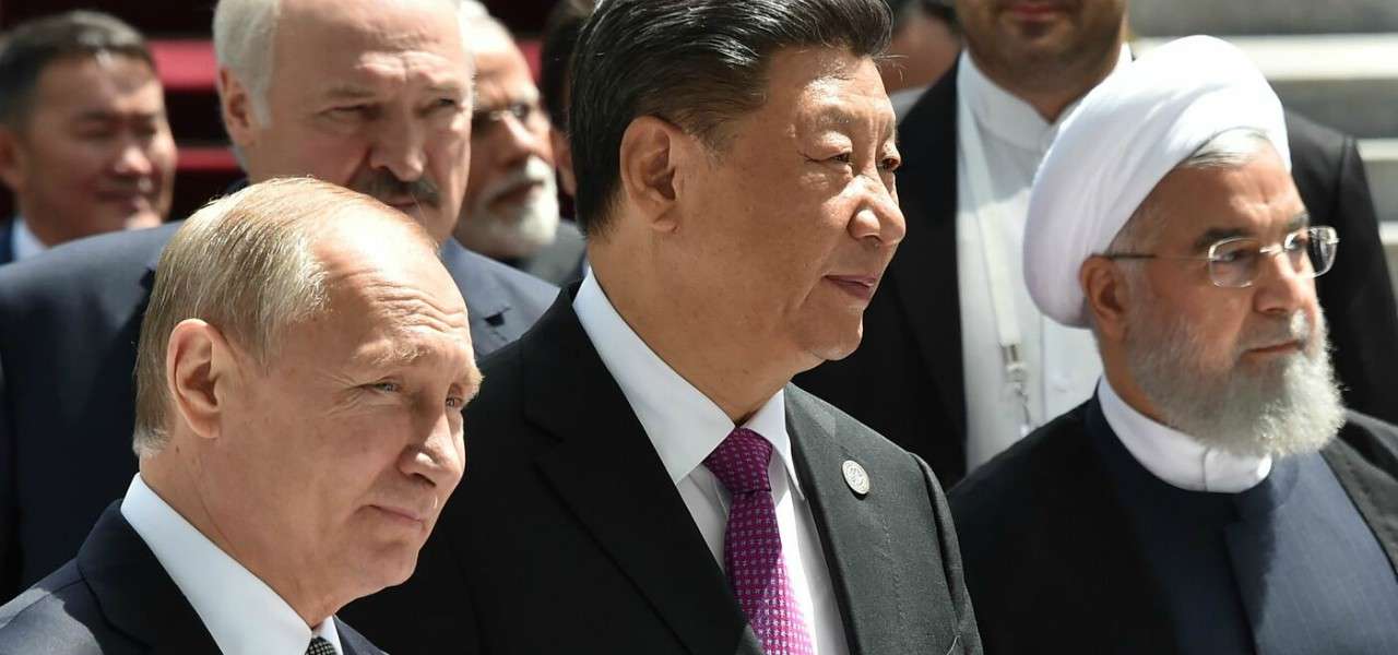Vladimir Putin, Xi Jinping e Hassan Rouani (LaPresse)
