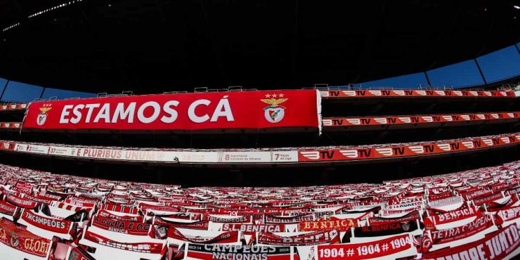 Empty seats are pictured prior of a Portuguese League soccer match between Benfica and Tondela in Lisbon, Portugal, Thursday, June 4, 2020. The Portuguese League soccer matches resumed Wednesday without spectators because of the coronavirus pandemic. (Tiago Petinga/Pool via AP)