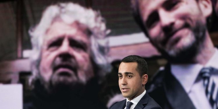 Luigi di Maio (M5s). Sullo sfondo, Grillo e Casaleggio (LaPresse)