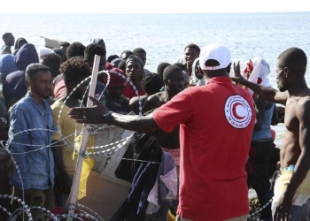 Immigrati subsahariani al confine tra Libia e Tunisia (LaPresse)