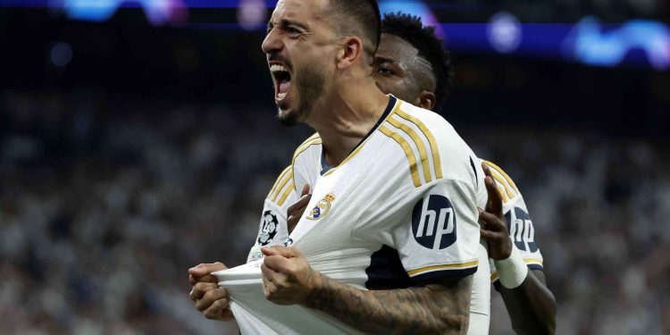 epaselect epa11327918 Joselu of Real Madrid celebrates after scoring the 1-1 goal during the UEFA Champions League semifinal second leg soccer match between Real Madrid and Bayern Munich, in Madrid, Spain, 08 May 2024.  EPA/JUANJO MARTIN