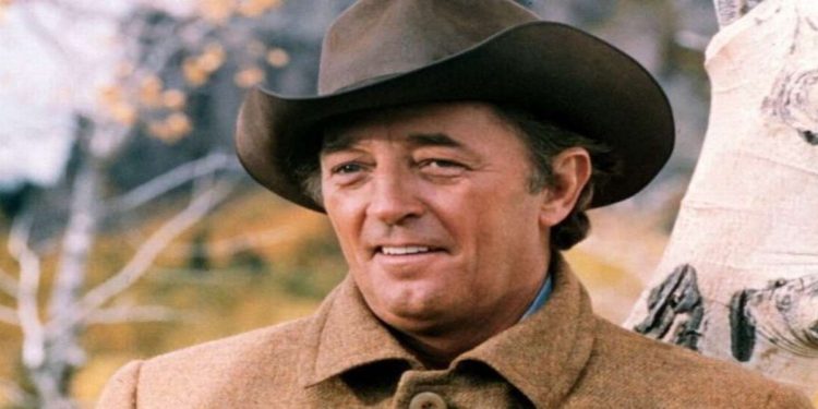 Robert Mitchum, in una scena del film nel pomeriggio di rete 4 (Foto Web)