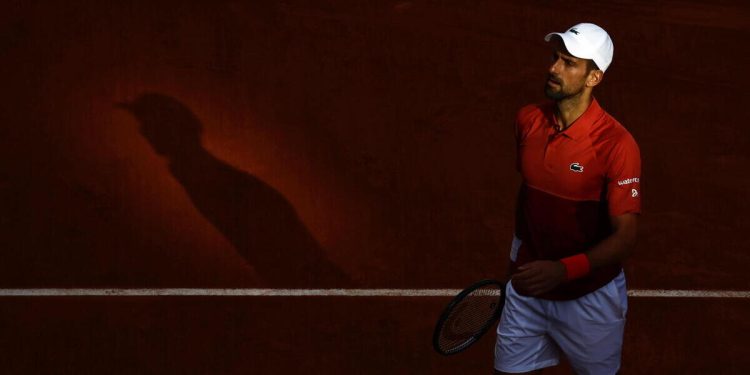 epa11387795 Novak Djokovic of Serbia looks on during his men's singles Round of 16 match against Francisco Cerundolo of Argentina at the French Open Grand Slam tennis tournament at Roland Garros in Paris, France, 03 June 2024.  EPA/YOAN VALAT