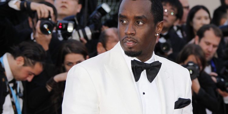 epa03230638 US rapper Sean John Combs known as Puff Daddy or P. Diddy arrives for the screening of 'Killing Them Softly' during the 65th Cannes Film Festival, in Cannes, France, 22 May 2012. The movie is presented in the Official Competition of the festival, which runs from 16 to 27 May.  EPA/GUILLAUME HORCAJUELO