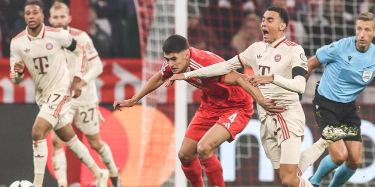 Antonio Silva contro Jamal Musiala in Bayern Benfica (Foto ANSA)